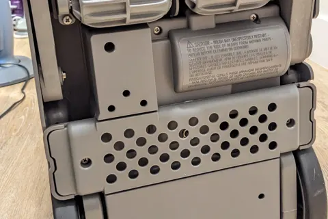 Brush and suction slot under the machine