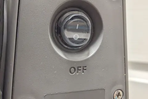 Power switch on the side of the machine